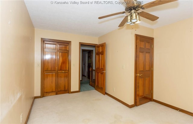 112 Willowood Cir, Hurricane, WV 25526 - unfurnished bedroom with light colored carpet, a closet, baseboards, and a ceiling fan