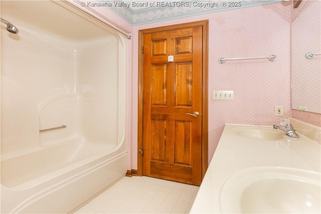112 Willowood Cir, Hurricane, WV 25526 - full bath featuring wallpapered walls, tile patterned floors, double vanity, and washtub / shower combination