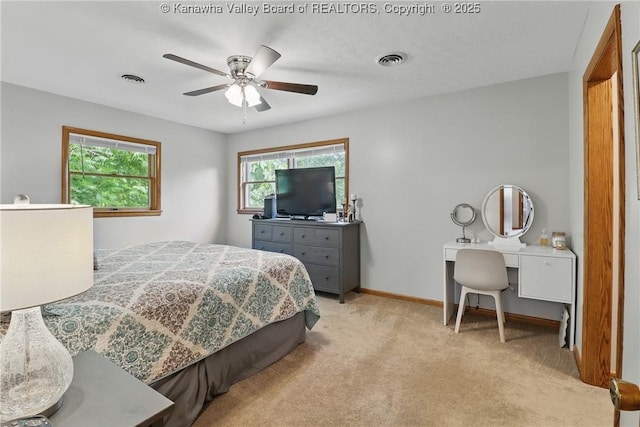 3021 Sansom Ct, Milton, WV 25541 - bedroom with light carpet, baseboards, and a ceiling fan