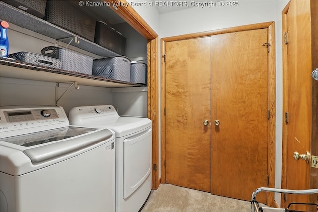 3021 Sansom Ct, Milton, WV 25541 - laundry area featuring washer and dryer and light carpet