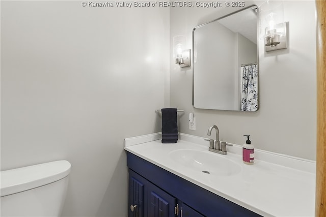 3021 Sansom Ct, Milton, WV 25541 - full bathroom with vanity and toilet
