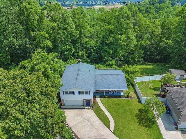 3021 Sansom Ct, Milton, WV 25541 - aerial view of property and surrounding area featuring a heavily wooded area
