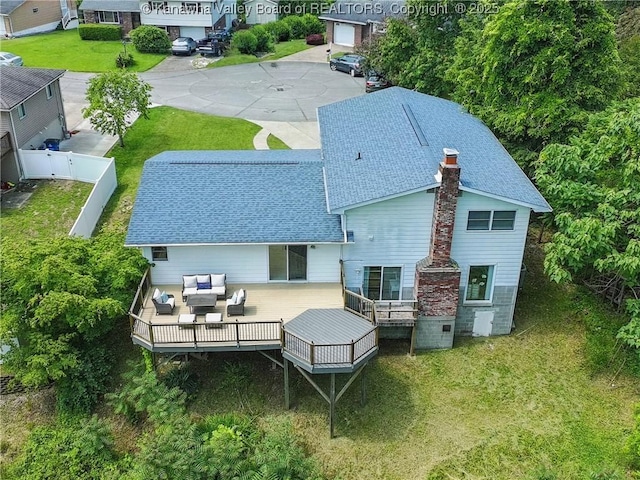 3021 Sansom Ct, Milton, WV 25541 - rear view of property with roof with shingles, outdoor lounge area, and a deck