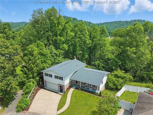 3021 Sansom Ct, Milton, WV 25541 - view from above of property featuring a heavily wooded area