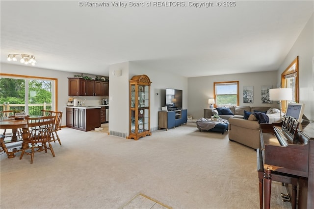 3021 Sansom Ct, Milton, WV 25541 - living area featuring healthy amount of natural light and light carpet