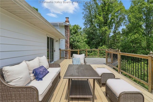 3021 Sansom Ct, Milton, WV 25541 - wooden deck featuring outdoor lounge area