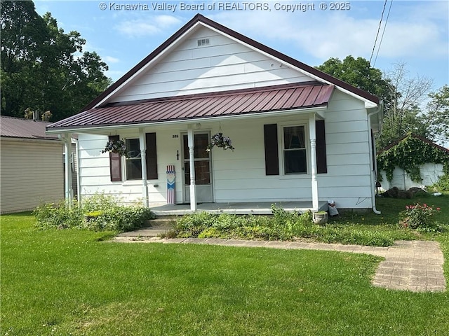 386 Maple St, Mason, WV 25260 - bungalow featuring a porch, a front lawn, and metal roof