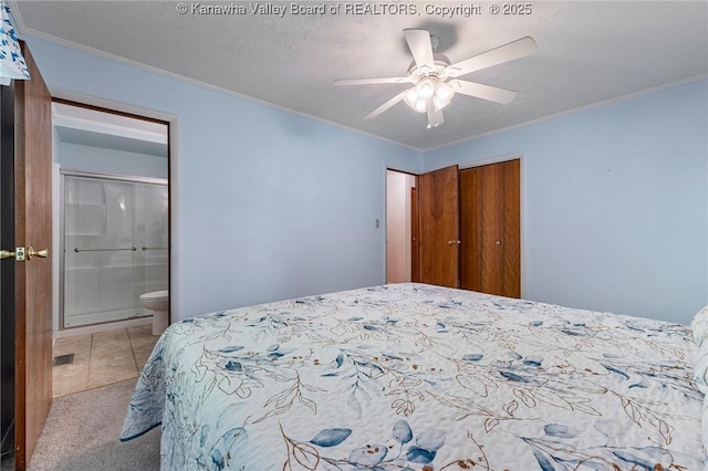 424 Porter Rd, Charleston, WV 25314 - bedroom with a closet, crown molding, ensuite bath, carpet flooring, and ceiling fan
