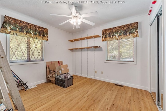 424 Porter Rd, Charleston, WV 25314 - unfurnished room with light wood-type flooring, a ceiling fan, and baseboards