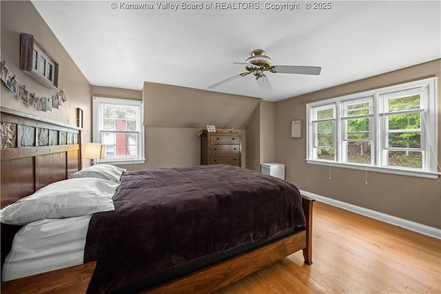 1539 Clark Rd, Charleston, WV 25314 - bedroom with baseboards, wood finished floors, lofted ceiling, and a ceiling fan