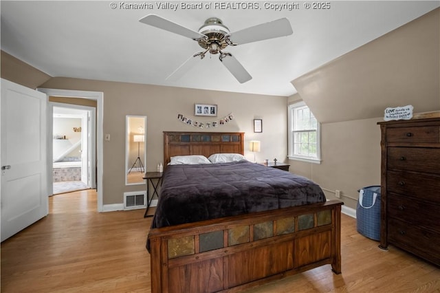 1539 Clark Rd, Charleston, WV 25314 - bedroom with light wood-type flooring, vaulted ceiling, baseboards, and ceiling fan