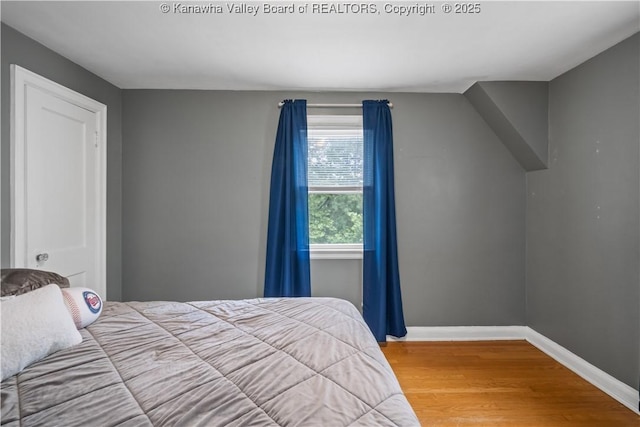 1539 Clark Rd, Charleston, WV 25314 - bedroom with wood finished floors and baseboards