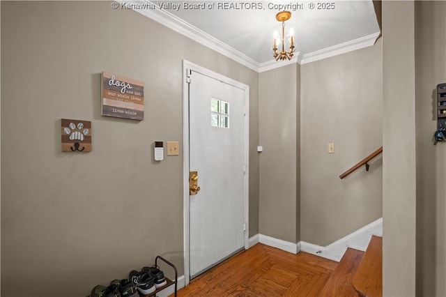 1539 Clark Rd, Charleston, WV 25314 - foyer entrance with a chandelier, ornamental molding, and baseboards