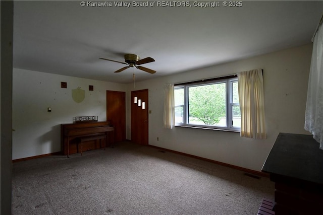 6 Coast Run Rd, Sandyville, WV 25275 - unfurnished living room with a ceiling fan, carpet floors, and baseboards