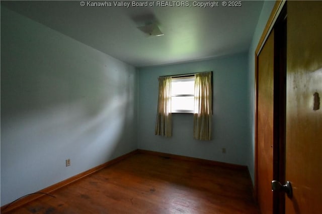 6 Coast Run Rd, Sandyville, WV 25275 - empty room featuring wood finished floors and baseboards