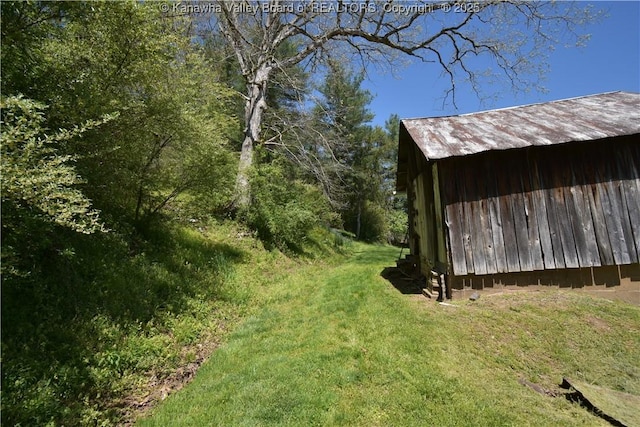 6 Coast Run Rd, Sandyville, WV 25275 - view of green lawn with an outdoor structure