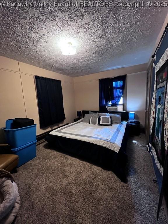 160 Davis St, Huntington, WV 25705 - carpeted bedroom featuring a textured ceiling