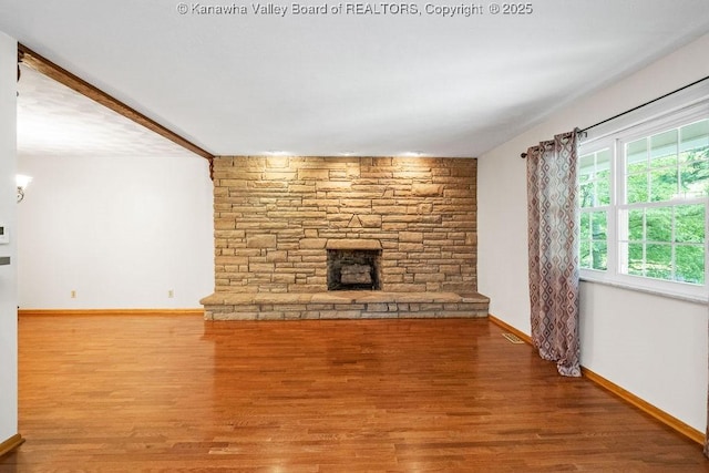 169 Burning Springs Dr, Belle, WV 25015 - unfurnished living room with baseboards and wood finished floors