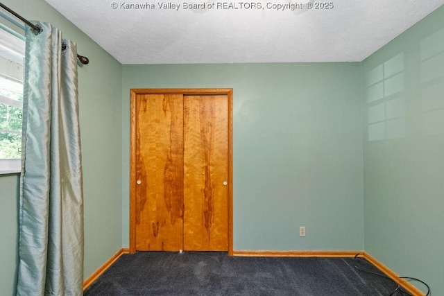 169 Burning Springs Dr, Belle, WV 25015 - unfurnished room with carpet, a textured ceiling, and baseboards