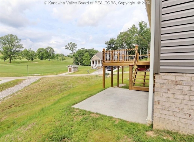4210 Fairway Xing, South Charleston, WV 25309 - view of green lawn featuring a patio area, stairway, and a deck