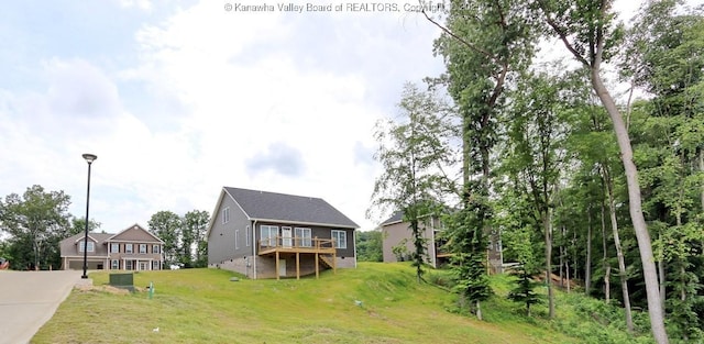 4210 Fairway Xing, South Charleston, WV 25309 - view of grassy yard featuring a deck