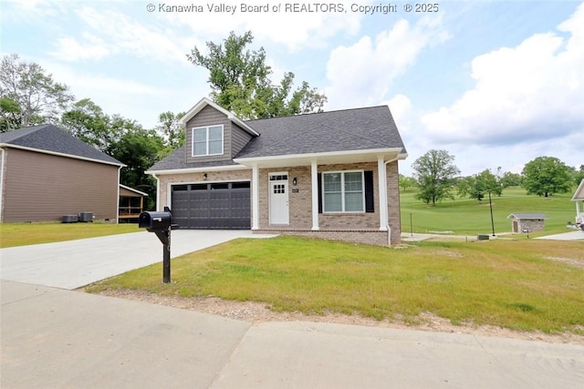 4210 Fairway Xing, South Charleston, WV 25309 - view of front of home featuring brick siding, concrete driveway, a front lawn, and a garage