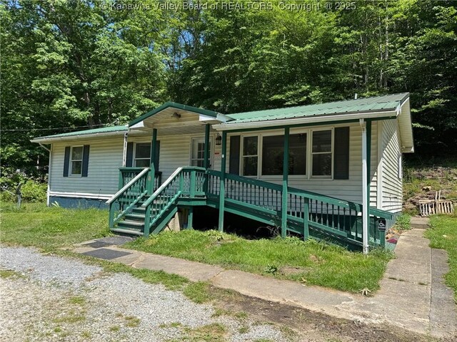 2608 Procious Maysel Rd, Wv, WV 25133 - view of front of house featuring covered porch and metal roof
