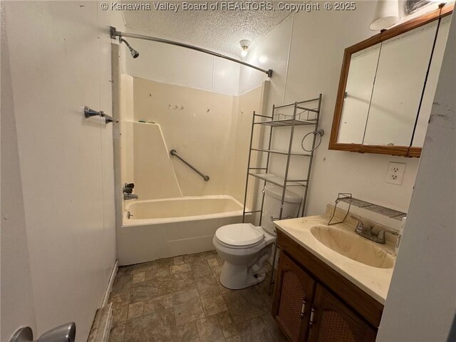 2608 Procious Maysel Rd, Wv, WV 25133 - full bathroom featuring washtub / shower combination, toilet, a textured ceiling, vanity, and stone finish flooring