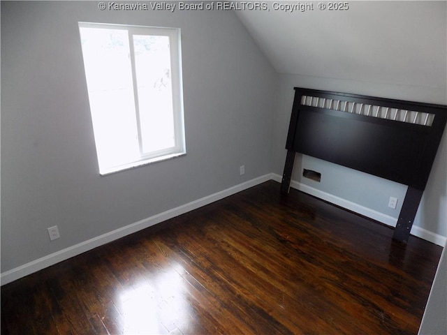 1004 E Riverview Dr, Belle, WV 25015 - bonus room with vaulted ceiling and dark wood-style flooring