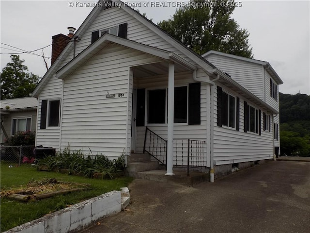 1004 E Riverview Dr, Belle, WV 25015 - view of front of home with a chimney and entry steps