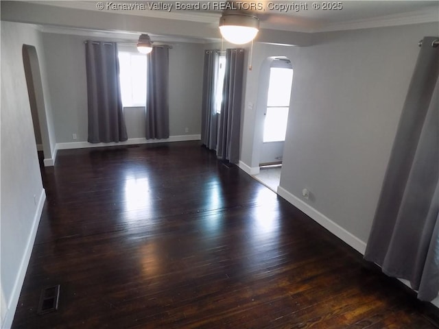 1004 E Riverview Dr, Belle, WV 25015 - unfurnished room with arched walkways, hardwood / wood-style floors, plenty of natural light, and ornamental molding