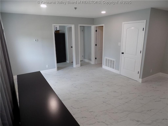 1004 E Riverview Dr, Belle, WV 25015 - unfurnished bedroom featuring light marble finish flooring and recessed lighting