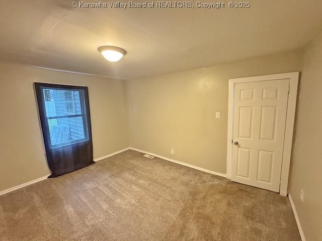 547 Garrison Ave, Charleston, WV 25302 - unfurnished room with carpet and baseboards