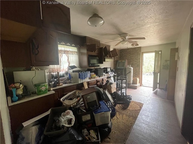 630 Melody Ln, Charleston, WV 25313 - kitchen with ceiling fan and a textured ceiling
