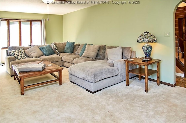 124 Morningside Dr, Elkview, WV 25071 - living area with arched walkways and carpet flooring