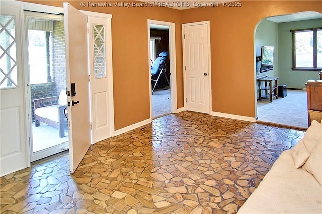 124 Morningside Dr, Elkview, WV 25071 - foyer entrance with arched walkways and stone floors