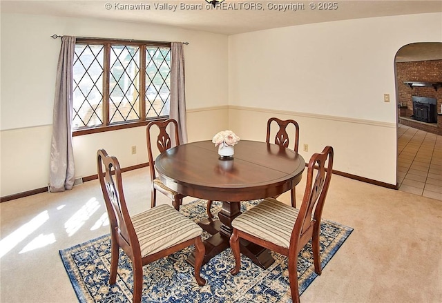124 Morningside Dr, Elkview, WV 25071 - dining room featuring light colored carpet and arched walkways