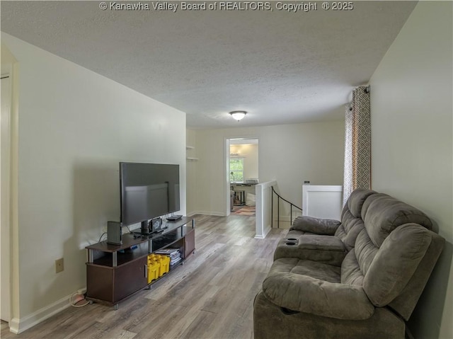 3742 Greenview Rd, South Charleston, WV 25309 - living room with wood finished floors and a textured ceiling