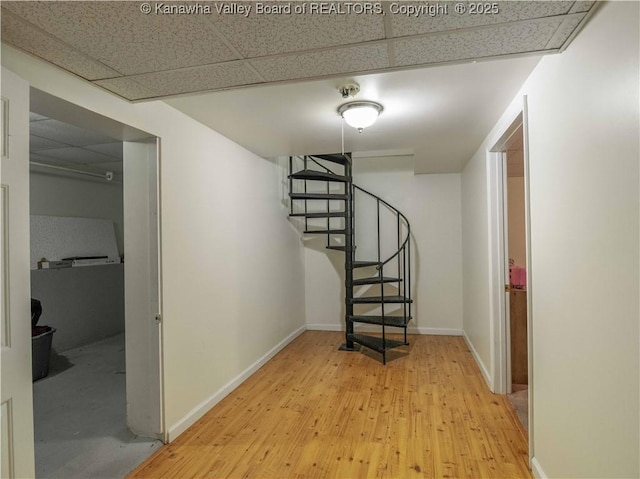 3742 Greenview Rd, South Charleston, WV 25309 - corridor featuring wood finished floors, a drop ceiling, and stairs