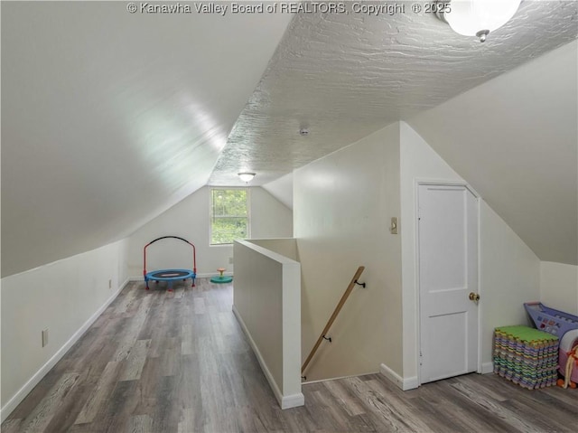 3742 Greenview Rd, South Charleston, WV 25309 - additional living space with wood finished floors and vaulted ceiling