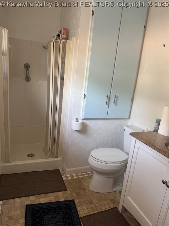 194 Shawnee Ests, Winfield, WV 25213 - full bathroom with vanity and a shower stall