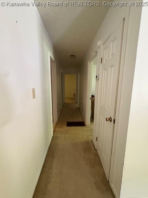 3202 Wallback Rd, Wallback, WV 25285 - hall featuring light carpet and a textured ceiling
