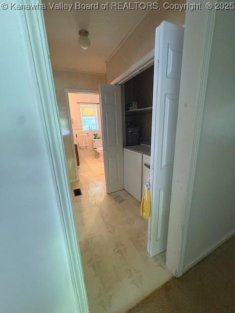 3202 Wallback Rd, Wallback, WV 25285 - hall featuring washer and dryer and light flooring