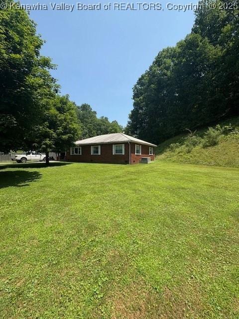 3202 Wallback Rd, Wallback, WV 25285 - view of side of home featuring a lawn