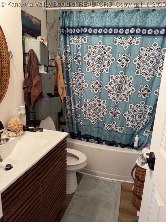 1003 Ridge Dr, South Charleston, WV 25309 - full bathroom featuring vanity, shower / tub combo, and wood finished floors