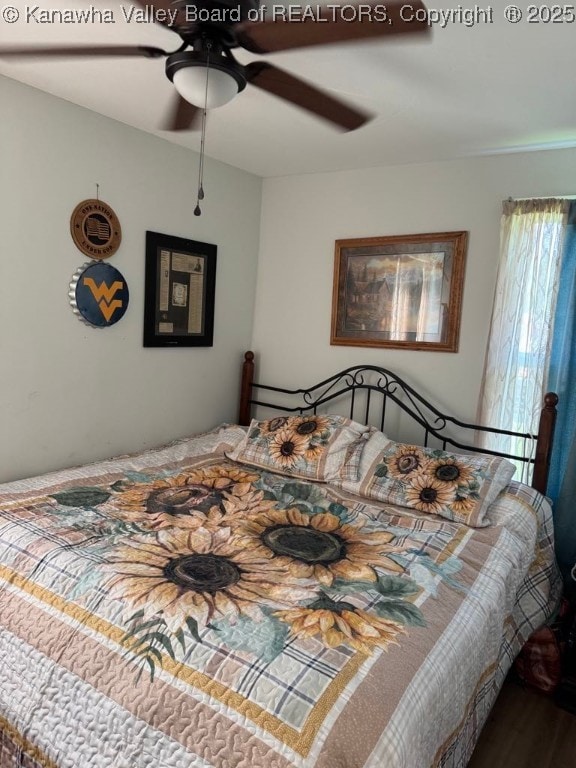 1003 Ridge Dr, South Charleston, WV 25309 - bedroom featuring a ceiling fan and wood finished floors