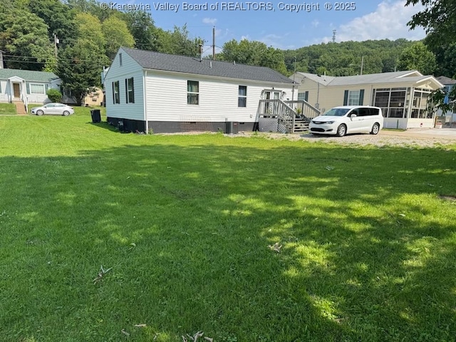 1003 Ridge Dr, South Charleston, WV 25309 - rear view of property with crawl space and a yard