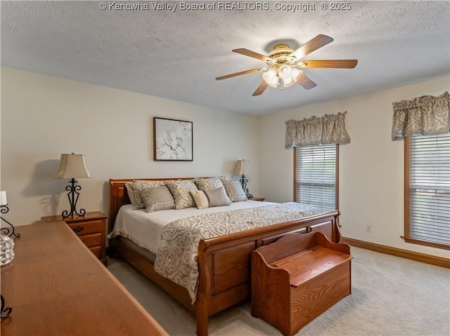 53 Wildrose Ln, Scott Depot, WV 25560 - bedroom with multiple windows, light colored carpet, a textured ceiling, and a ceiling fan