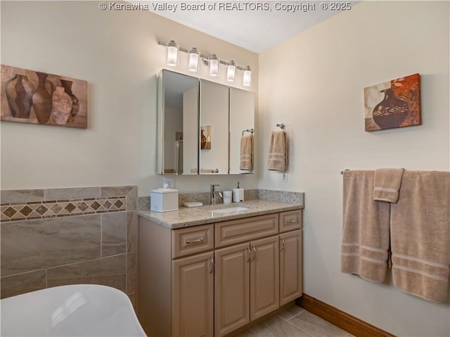 53 Wildrose Ln, Scott Depot, WV 25560 - bathroom with vanity and a freestanding tub