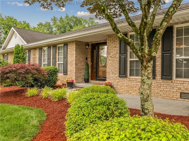 53 Wildrose Ln, Scott Depot, WV 25560 - doorway to property with brick siding